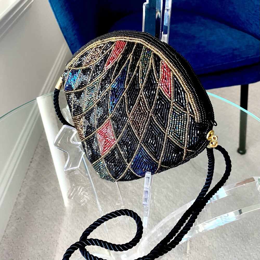 Small multi color beads decorated bag.